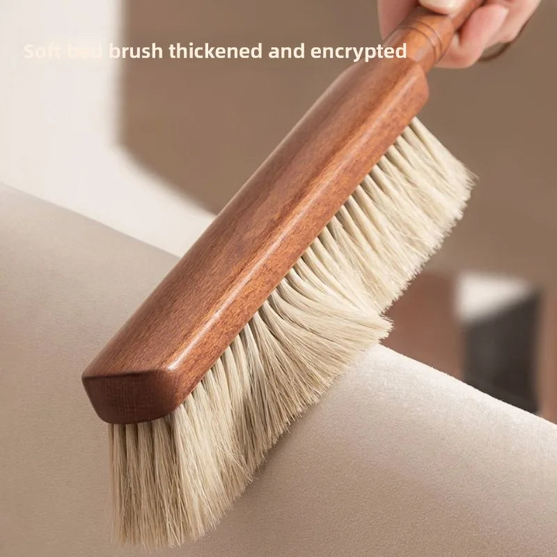 Wooden eco brush designed for gentle cleaning with soft bristles, ideal for dusting beds and furniture.