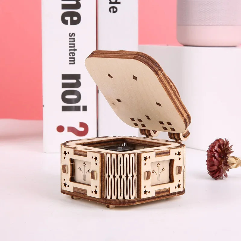 3D DIY music box puzzle with opened lid showcasing intricate wooden design on a table.